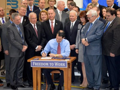 州长斯科特·沃克签署法案，减轻威斯康星州的税收负担，促进货运流通