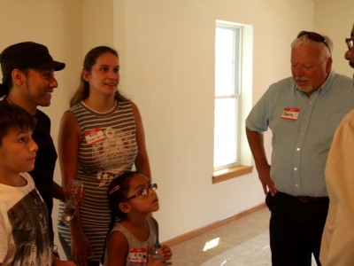 Young Workers Building Homes in Walker Square