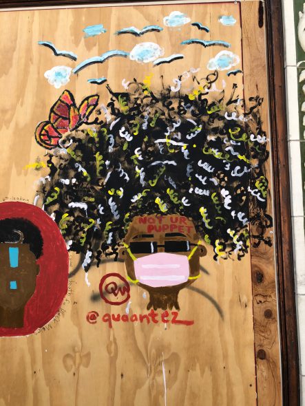州立街道“黑人的命也重要”的艺术在木板窗户和其他地方。照片由Melanie Conklin/Wisconsin拍摄